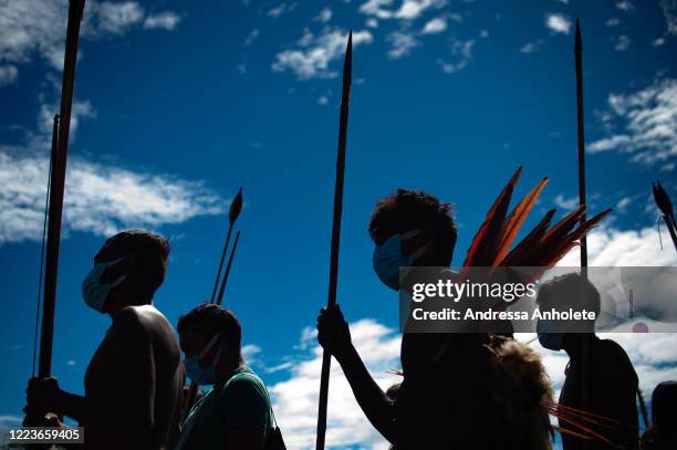 Ye'kuana and Yanomami Indians arrive for health care at the 5º Special Border Platoon amidst the coronavirus pandemic at the Auaris on June 30, 2020...