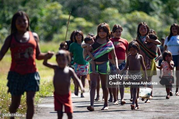 Ye'kuana and Yanomami Indians arrive for health care at the 5º Special Border Platoon amidst the coronavirus pandemic at the Auaris on June 30, 2020...