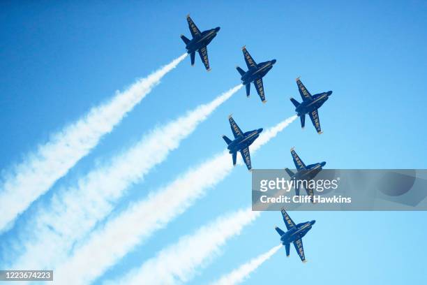 The Blue Angels fly over downtown Miami on May 08, 2020 in Miami Florida. The Blue Angels took to the sky to pay tribute to the front line workers...