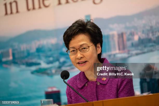 Hong Kong's Chief Executive Carrie Lam takes part in a press conference at the government headquarters, on the 23rd anniversary of the city's...