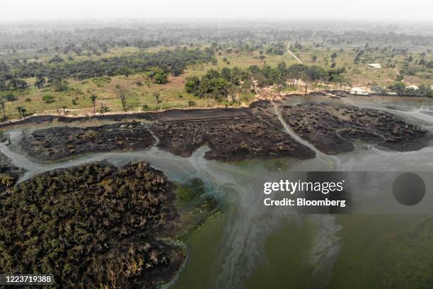 Crude oil pollutes the waters of an estuary in this aerial photograph taken over B-Dere, Ogoni, Nigeria, on Saturday, Feb. 1, 2020. Nigerians from...