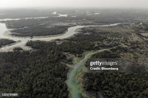 Crude oil pollutes the waters of an estuary in this aerial photograph taken over B-Dere, Ogoni, Nigeria, on Saturday, Feb. 1, 2020. Nigerians from...