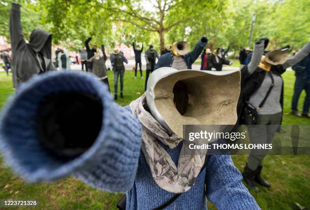 Picture taken on July 1, 2020 shows a view of an installation by Syrian artist Khaled Barakeh titled "The Muted Demonstration" which consists of...