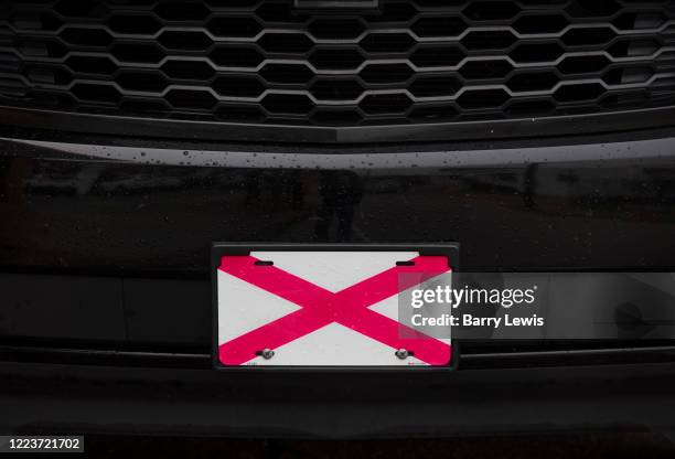 The flag of the State of Alabama on car bumper 5th March 2020 in downtown Dothan, 'The Peanut Capital of the World', Alabama, United States of...