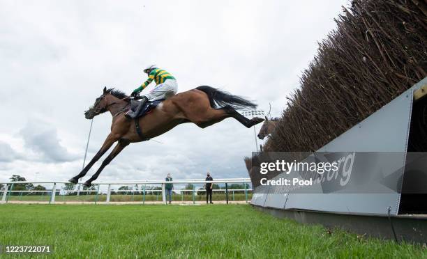 Jockey Harry Cobden riding Nineohtwooneoh jumps the last fence to win the Sign Solutions Nottingham Novices' Handicap Chase at Southwell Racecourse...