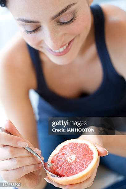 healthy eating - woman grapefruit stock pictures, royalty-free photos & images