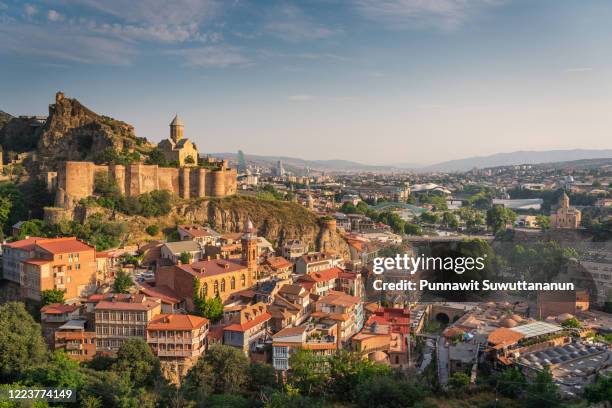 tbilisi capital city of georgia in a morning sunrise, georgia city - georgien stock-fotos und bilder