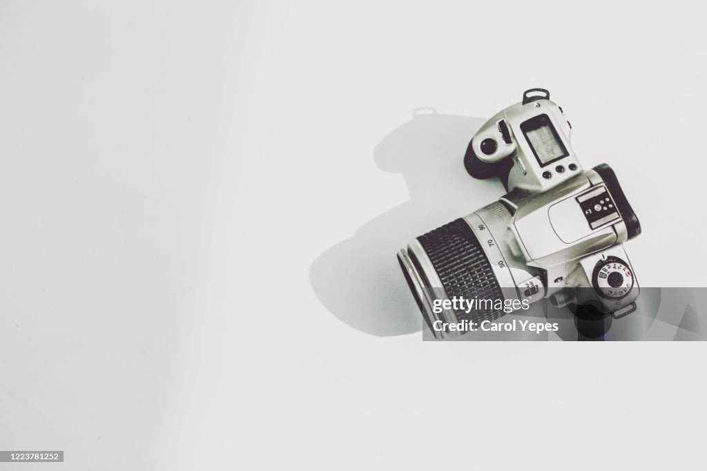 Slr camera top view in white