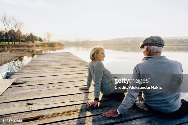 Senior couple on a lake dock