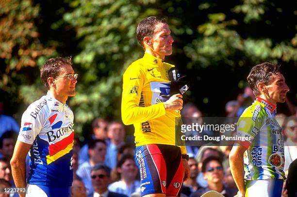 Alex Zulle of Switerland, Lance Armstrong of the USA and Fernando Escartin Spain after stage 20 of the 1999 Tour de France betweenArpajon and Paris,...
