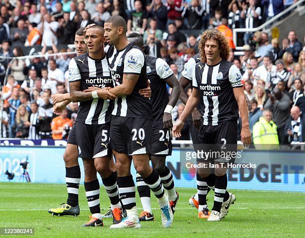 Leon Best celebrates scoring the second goal with Danny Simpson during the Barclays Premier League game between Newcastle United and Fulham at St...