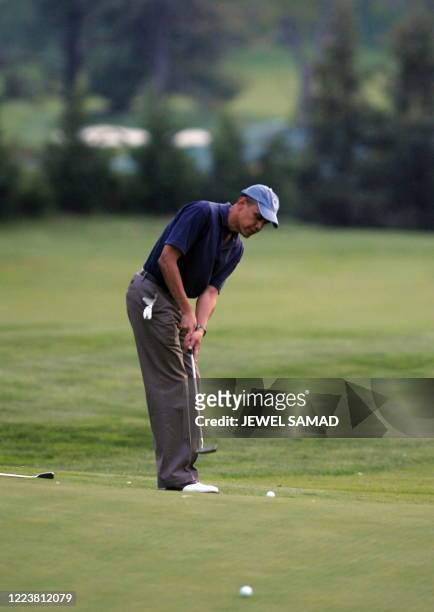 President Barack Obama plays golf at the Grove Park Inn in Asheville, North Carolina, on April 23, 2010. The First Couple arrived in Asheville on...