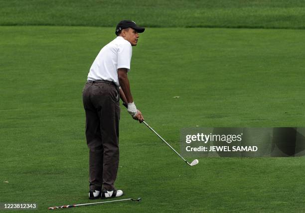 President Barack Obama plays golf on Martha's Vineyard, Massachusetts, on August 25, 2010. The US First Family is vacationing on the Island till...