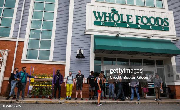 Over 20 workers at Whole Foods grocery store stage a walkout Tuesday during a protest in Cambridge, MA on June 30, 2020. Whole Foods employees were...