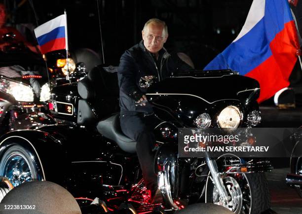 Russian Prime Minister Vladimir Putin rides a motorcycle on August 29, 2011 at a bikers' festival in the Black Sea port of Novorossiysk, Russia....
