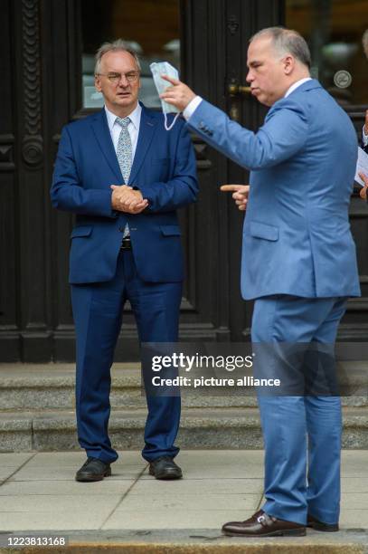 July 2020, Saxony-Anhalt, Magdeburg: Reiner Haseloff , Minister President of the State of Saxony-Anhalt, and Dirk Wössner , Member of the Board of...