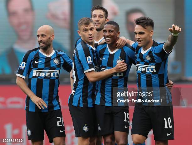Ashley Young of FC Internazionale celebrates after scoring the opening goal with team-mates during the Serie A match between FC Internazionale and...