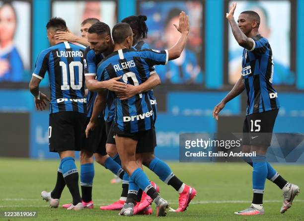 Danilo D Ambrosio of FC Internazionale celebrates his goal with his team-mate Alexis Sanchez and Ashley Young during the Serie A match between FC...