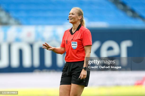 Referee Bibiana Steinhaus gestures during the 3. Liga match between Hansa Rostock and KFC Uerdingen at Ostseestadion on July 1, 2020 in Rostock,...