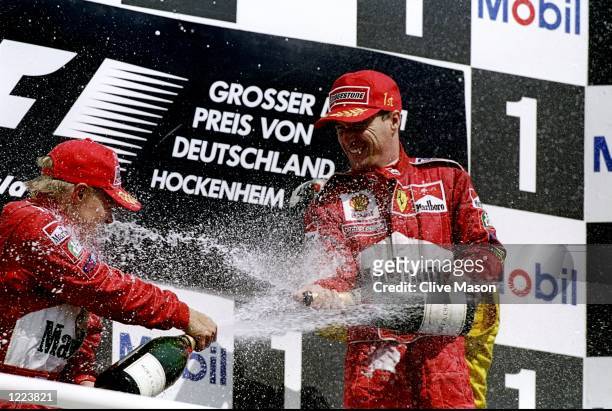 Eddie Irvine of Northern Ireland and Ferrari celebrates winning the German Formula One Grand Prix held in Hochenheim, Germany. \ Mandatory Credit:...