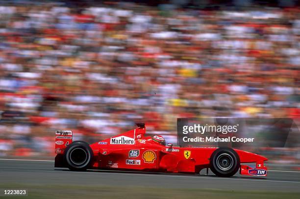 Eddie Irvine of Northern Ireland races the Ferrari during the German Formula One Grand Prix held in Hochenheim, Germany. \ Mandatory Credit: Michael...