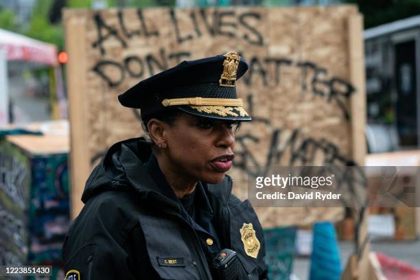 Seattle Police Chief Carmen Best addresses the press as city crews dismantle the Capitol Hill Organized Protest area outside of the Seattle Police...