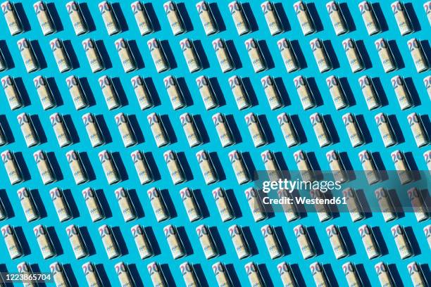 twenty euro rolled banknotes pattern on a blue background - twenty euro note bildbanksfoton och bilder