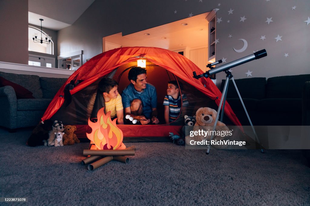 Father and Sons Camping Indoors