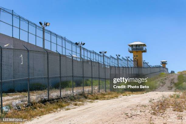 the high walls of the maximum security penitentiary of el hongo in the state of baja california in northern mexico - prison building stock pictures, royalty-free photos & images