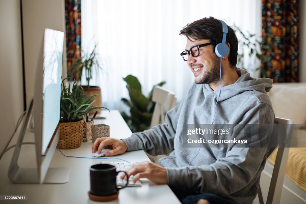 Young men working from home