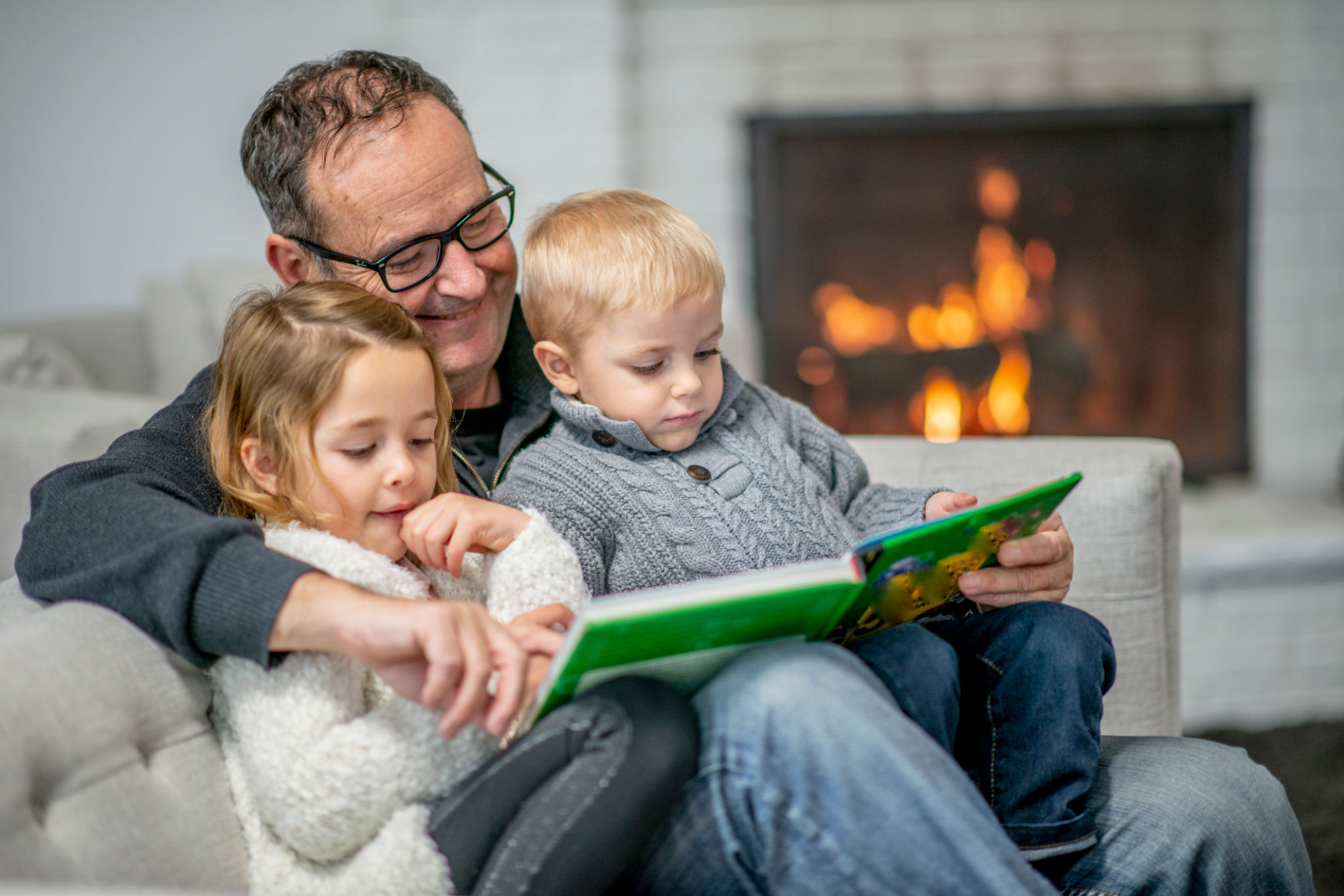 family by fireplace