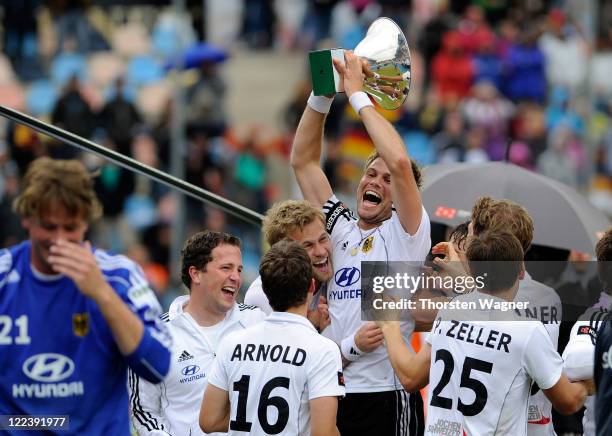 Moritz Fuerste best player of tournament with the trophy, pictured after the EuroHockey 2011 final match between Netherlands and Germany at...