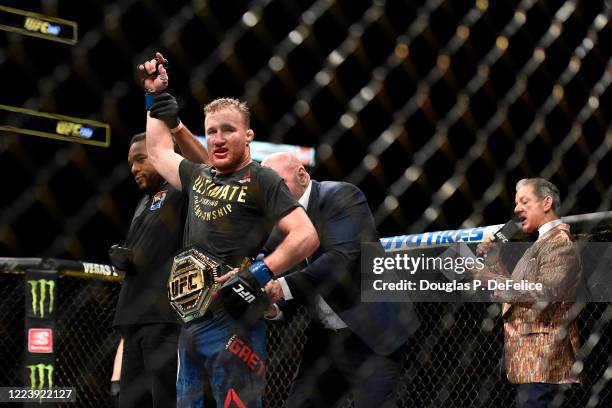 Justin Gaethje of the United States celebrates after defeating Tony Ferguson of the United States in their Interim lightweight title fight during UFC...