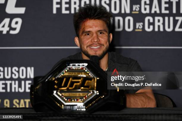 Henry Cejudo of the United States speaks to the media after his bantamweight title fight against Dominick Cruz of the United States during UFC 249 at...