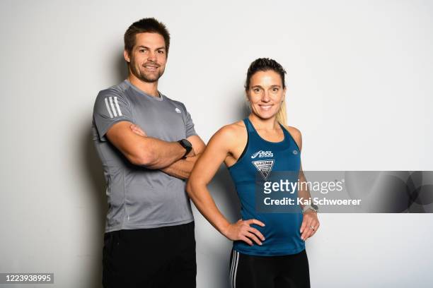 New Zealand Black Sticks field hockey player Gemma McCaw and her husband, former All Blacks captain Richie McCaw, pose during a training session in...