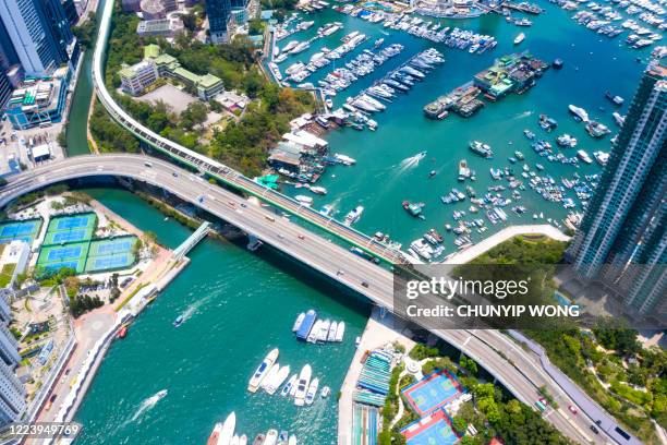 aerial view of aberdeen typhoon shelters and ap lei chau, hong kong - hong kong junk boat stock pictures, royalty-free photos & images