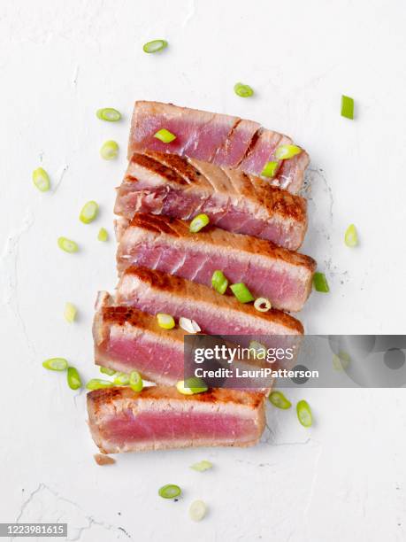 marinated seared tuna steak - sears canada stock pictures, royalty-free photos & images