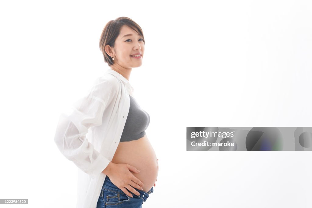 Young pregnant woman Smiling with casual wear