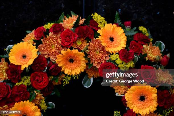 Claret and amber wreath of flowers laid at the Valley Parade Fire Memorial in memory of the victims of tragedy, outside Utilita Energy Stadium, also...