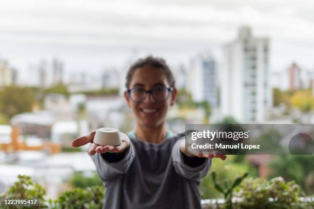 beautiful young woman eco friendly with natural solid shampoo hair in his hands - hard choice stock pictures, royalty-free photos & images