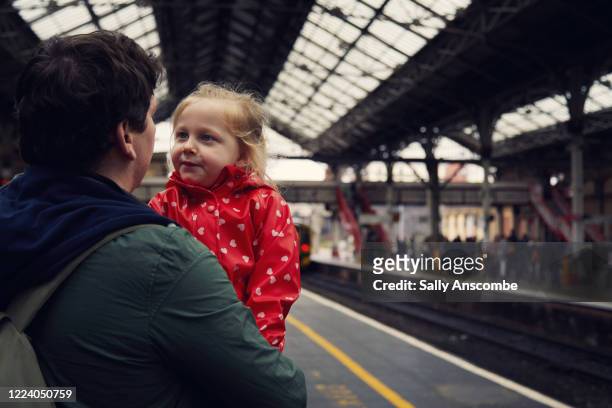 family waiting for the train - girls on train track stock pictures, royalty-free photos & images