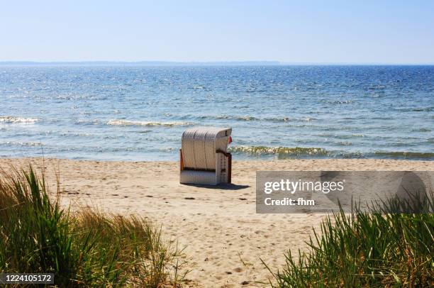 beach chair on the beach - timmendorfer strand stock-fotos und bilder