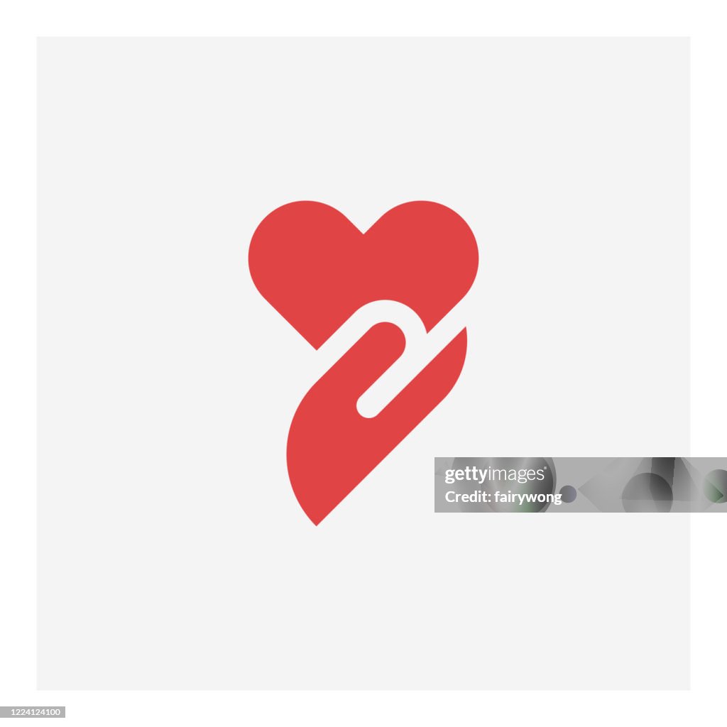 Icono corazón en mano