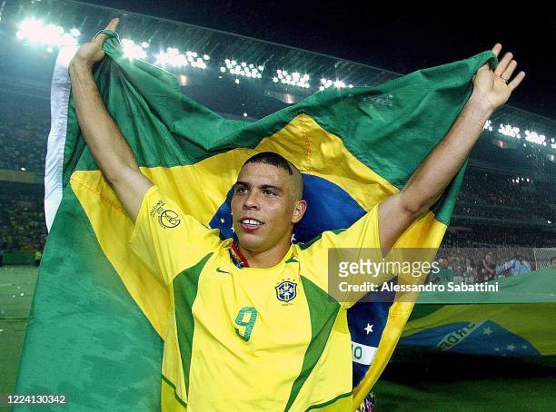 Ronaldo Luís Nazário de Lima of Brazil celbrates the victory with the brazilia flag after the Fifa World Cup Final 2002 match between Germany and...