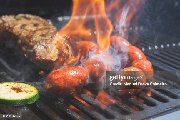 chorizo bbq - madrid tapas stock pictures, royalty-free photos & images