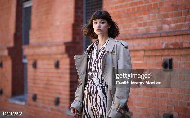 Lea Neumann wearing Burberry trenchcoat and weekday pants and shirt on May 06, 2020 in Berlin, Germany.