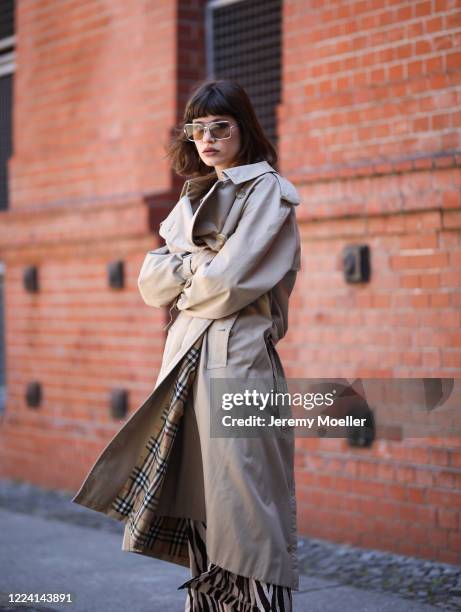 Lea Neumann wearing Burberry trenchcoat and weekday pants and shirt on May 06, 2020 in Berlin, Germany.