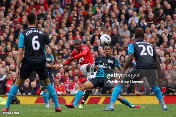 Ashley Young of Manchester United curls the ball and scores his side's second goal during the Barclays Premier League match between Manchester United...