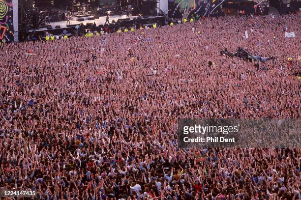 Aerial view of a large crowd in the audeicne at Freddie Mercury tribut concert, Wembley Stadium, London, 20th April 1992.