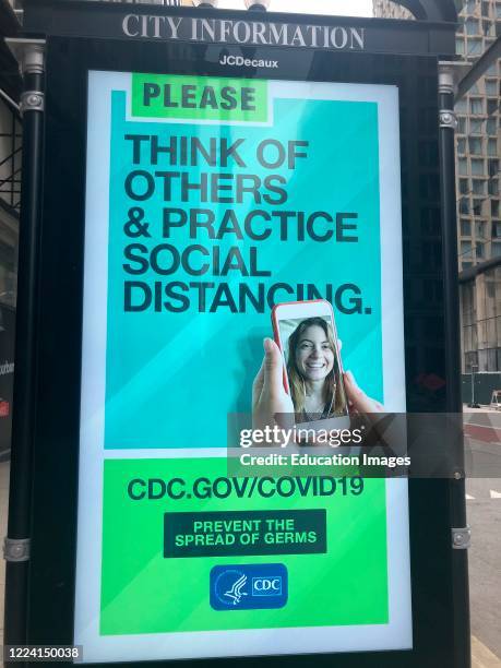 Information sign, practice social distancing during Coronavirus Pandemic, Chicago, Illinois.